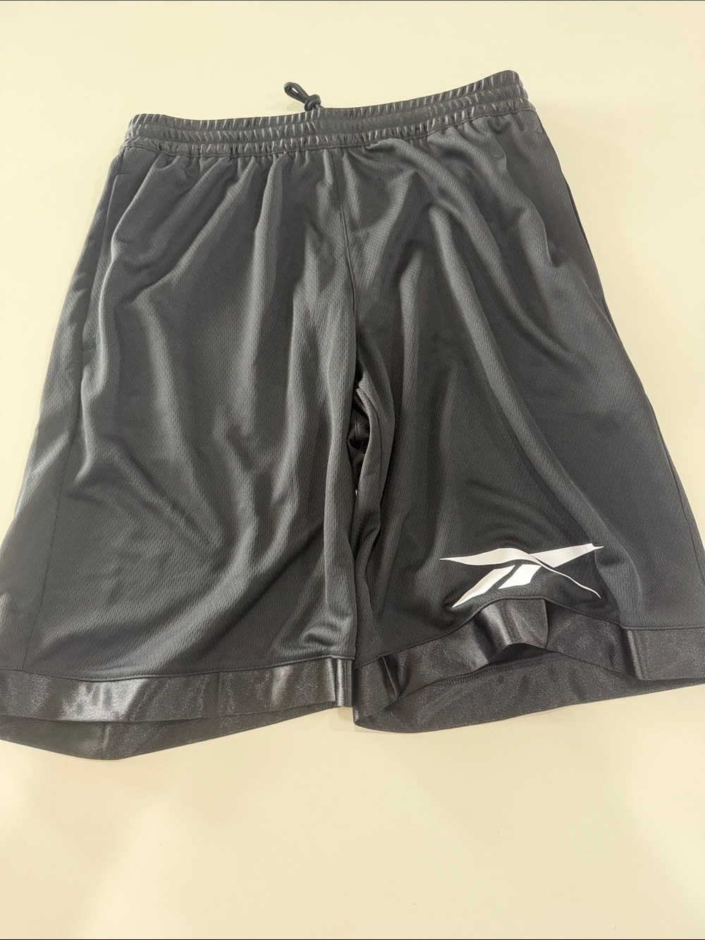 Reebok Men's Black Athletic Mesh Shorts with White Logo